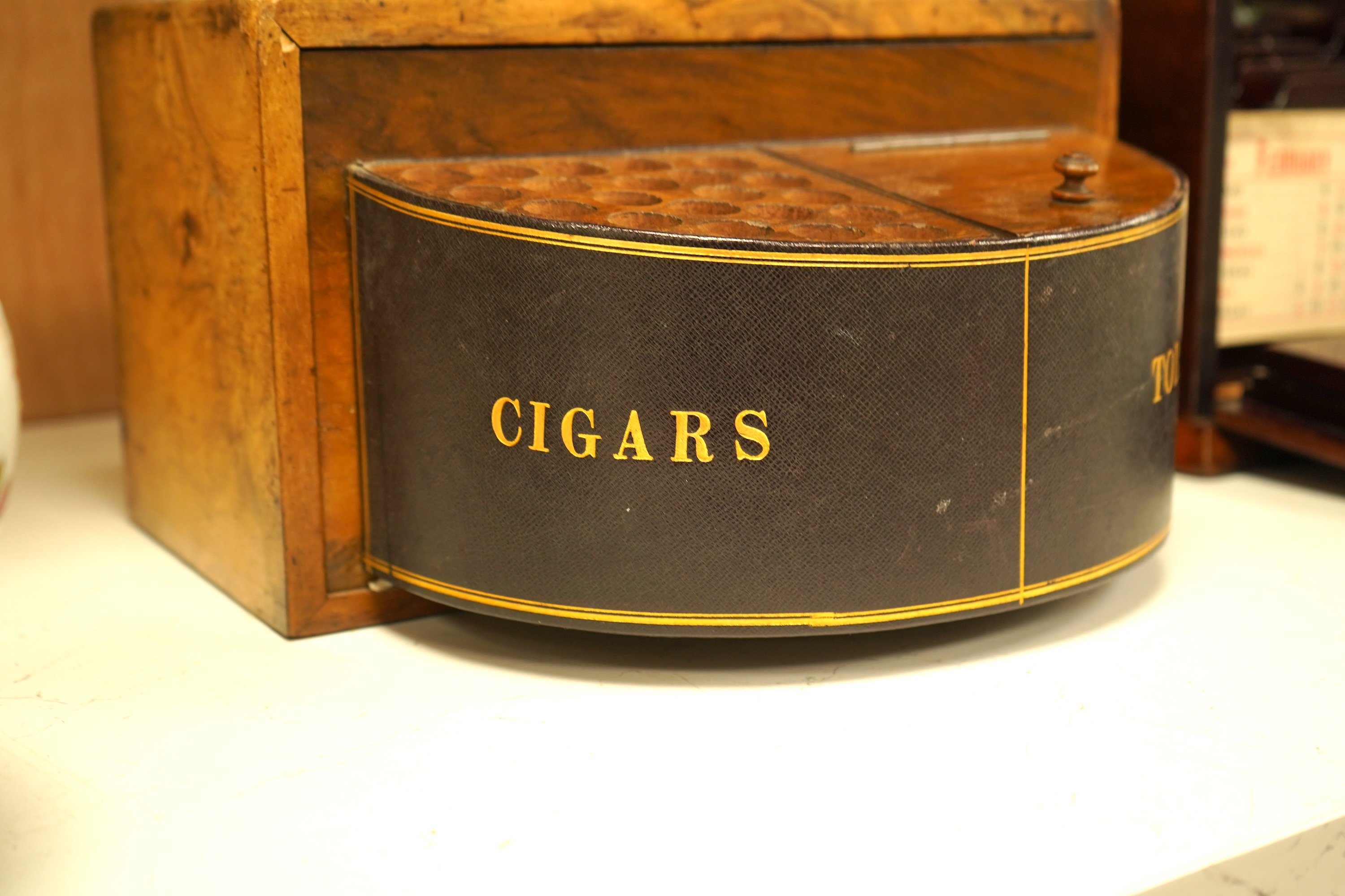 An Edwardian inlaid mahogany writing casket with fitted interior and a late Victorian faded walnut cigar box, largest 32cm wide